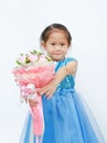 Portrait of a cute little child girl with Bouquet of roses isolated on white background Royalty Free Stock Photo