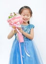 Portrait of a cute little child girl with Bouquet of roses isolated on white background Royalty Free Stock Photo