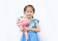 Portrait of a cute little child girl with Bouquet of roses isolated on white background Royalty Free Stock Photo