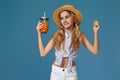 Portrait of cute little child girl drinking orange juice Royalty Free Stock Photo