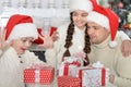 Portrait of cute little children and father with gifts Royalty Free Stock Photo