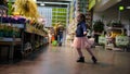 Portrait of cute little dancing girl in supermarket Royalty Free Stock Photo