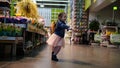 Portrait of cute little dancing girl in supermarket Royalty Free Stock Photo