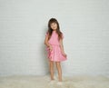 Portrait of cute little girl brick wall Royalty Free Stock Photo