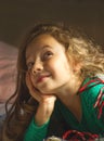 portrait of cute little girl dreaming in bed Royalty Free Stock Photo