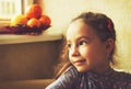 Portrait of cute little girl dreaming. Toned Royalty Free Stock Photo