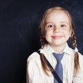 Portrait of cute little girl. Happy child smiling on empty black Royalty Free Stock Photo