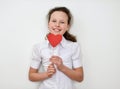 Portrait of cute little girl holding red heart.Isolated on white background. Royalty Free Stock Photo