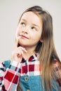 Portrait of a cute little girl. kid fashion. the child thought and dreamed up. children`s emotion Royalty Free Stock Photo