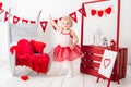 Portrait of a cute little girl in a red skirt Royalty Free Stock Photo