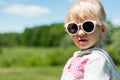 Portrait of a cute little girl wearing sunglasses. Royalty Free Stock Photo