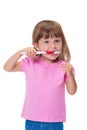 Portrait of cute little girl 3 year old in pink t-shirt brushing her teeth isolated on white background Royalty Free Stock Photo