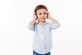 Portrait of a cute little kid in headphones Royalty Free Stock Photo