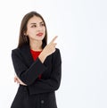 Portrait of cute mature businesswoman wearing black suit in professional confident pointing finger to blank space in advertising Royalty Free Stock Photo