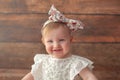 Portrait of the one year old girl. With headband. Royalty Free Stock Photo