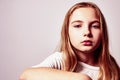 Portrait of a pretty pensive teenage girl with long hair. Pretty woman face close up Royalty Free Stock Photo