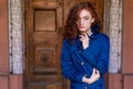 Portrait of cute red-haired girl , wavy hair and beautiful eyes Royalty Free Stock Photo