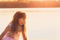 Portrait of cute sad little girl looking worried at summer day Royalty Free Stock Photo