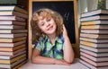 Portrait of cute schoolgirl raising hand Royalty Free Stock Photo