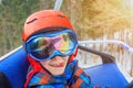 Portrait of Cute skier boy in a winter ski resort. Royalty Free Stock Photo