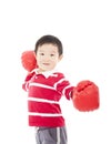 Portrait of a cute sporty boy in boxing gloves Royalty Free Stock Photo