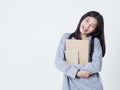 Girl student holding books with backpacks