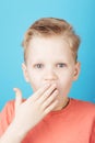 Portrait of cute surprised boy with stylish hairstyle. Royalty Free Stock Photo