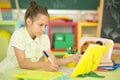 Cute teen girl doing homework in her room Royalty Free Stock Photo