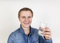 Portrait of cute teenage boy drinking water Royalty Free Stock Photo