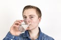 Portrait of cute teenage boy drinking water Royalty Free Stock Photo