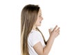 Portrait of a cute 7 years old girl Isolated over white background with milk glass Royalty Free Stock Photo