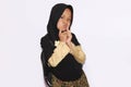 Portrait of cute A young asian little girl 6-7 years old muslim, wearing hijab, show face expression