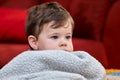 portrait of a cute young boy and his safety blanket Royalty Free Stock Photo