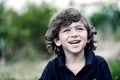 Portrait of a cute young boy outside Royalty Free Stock Photo