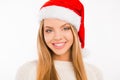 Portrait of a cute young woman smiling with santa hat Royalty Free Stock Photo