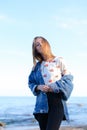 Portrait of cute young woman who poses and smiles in camera, sta Royalty Free Stock Photo