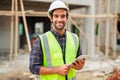 Portrait of cvil engineer with safety uniform working at construction site outdoor, Construction worker checking and