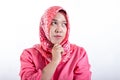 Portrait of cynical Asian muslim woman with suspicious expression Royalty Free Stock Photo