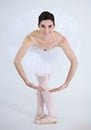 Portrait, dance and ballet with a woman in studio on a white background for rehearsal or recital for theatre performance