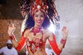 Portrait, dance and costume for Brazilian female dancer, celebration and traditional festival. Carnival, smile or samba