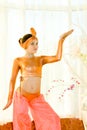 Portrait of dance teen girl in east suit Royalty Free Stock Photo