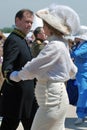 Portrait of dancing man in black and woman in white