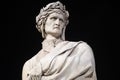 Portrait of Dante Alighieri statue in Santa Croce square in Florence at night