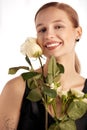 Portrait of a dark blond lady with a gentle makeup. The girl is wearing golden stud earrings made out of pearl beads Royalty Free Stock Photo