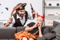 portrait of daughter and father in halloween costumes playing Royalty Free Stock Photo