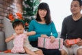 Portrait of a daughter wearing deer headband opened a christmas Royalty Free Stock Photo