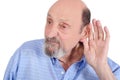 Portrait of deaf old man trying to listen Royalty Free Stock Photo