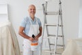 Portrait Of Decorator Painting Room Royalty Free Stock Photo