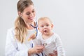 Portrait of a dedicated pediatric care specialist smiling while