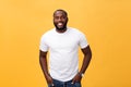 Portrait of delighted African American male with positive smile, white perfect teeth, looks happily at camera, being